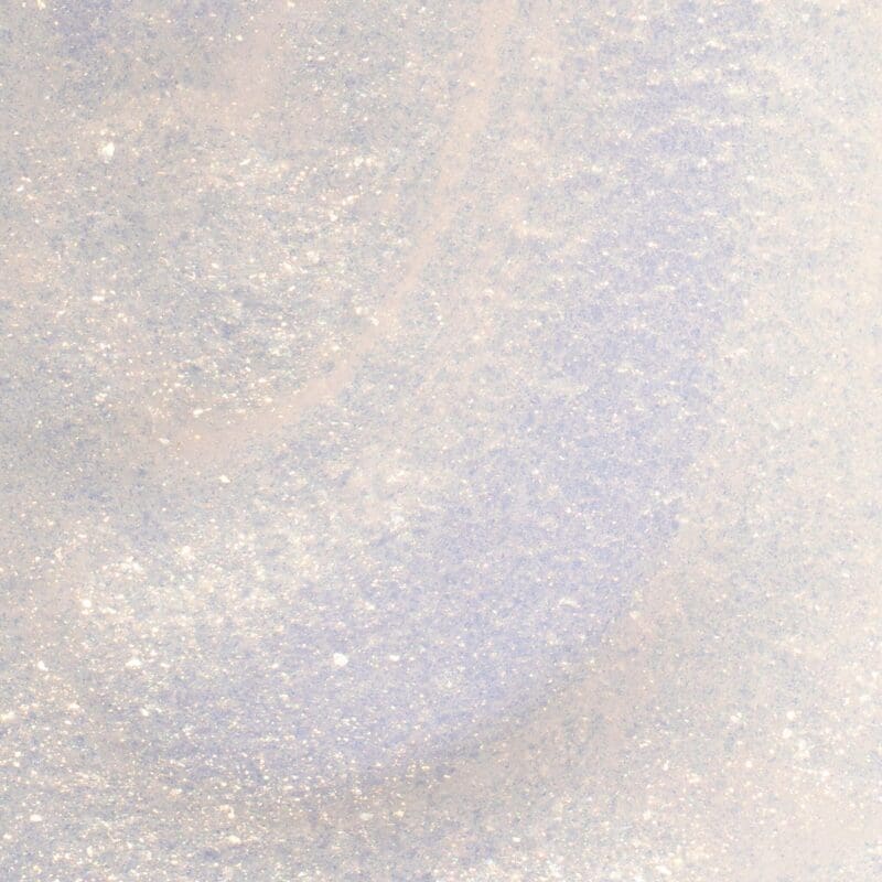Close up of an Apres Gel Color Glitter 0.5z textured surface in blue and white.