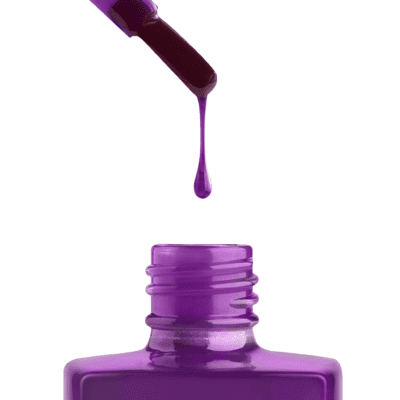 A bottle of apres Gel Color Jelly is being dripped onto a white background.